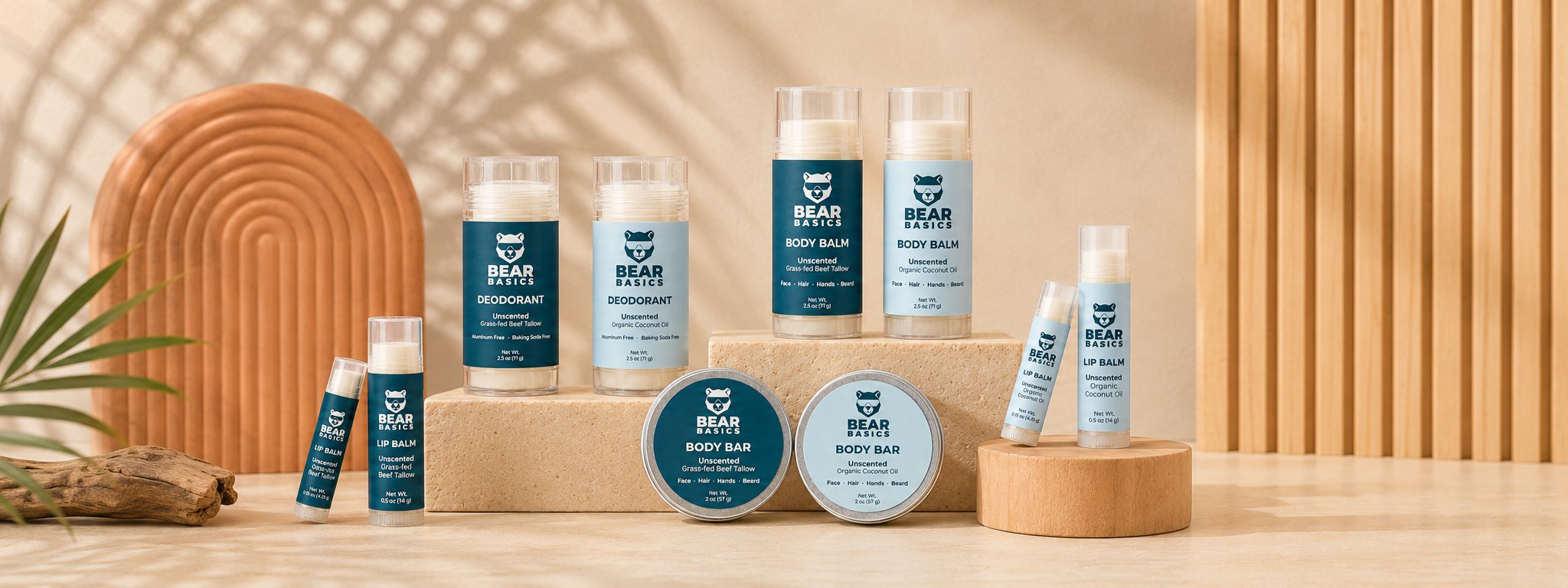 The full Bear Basics lineup — lip balm, body bar, body balm, and deodorant